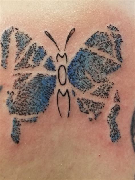 Fluttering Beauty: Top 10 Thumbprint Butterfly Tattoo Designs